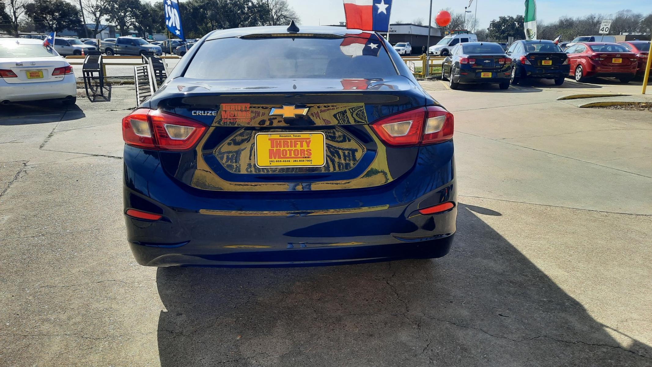 2019 Chevrolet Cruze (1G1BC5SM8K7) , located at 16710 Clay Rd., Houston, TX, 77084, (281) 859-7900, 29.834864, -95.656166 - Photo #2